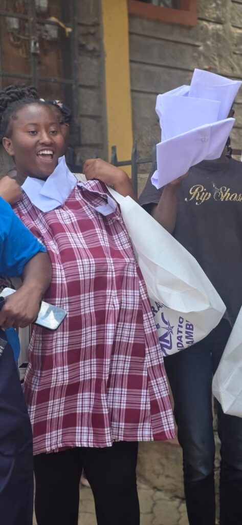 Student receiving a uniform